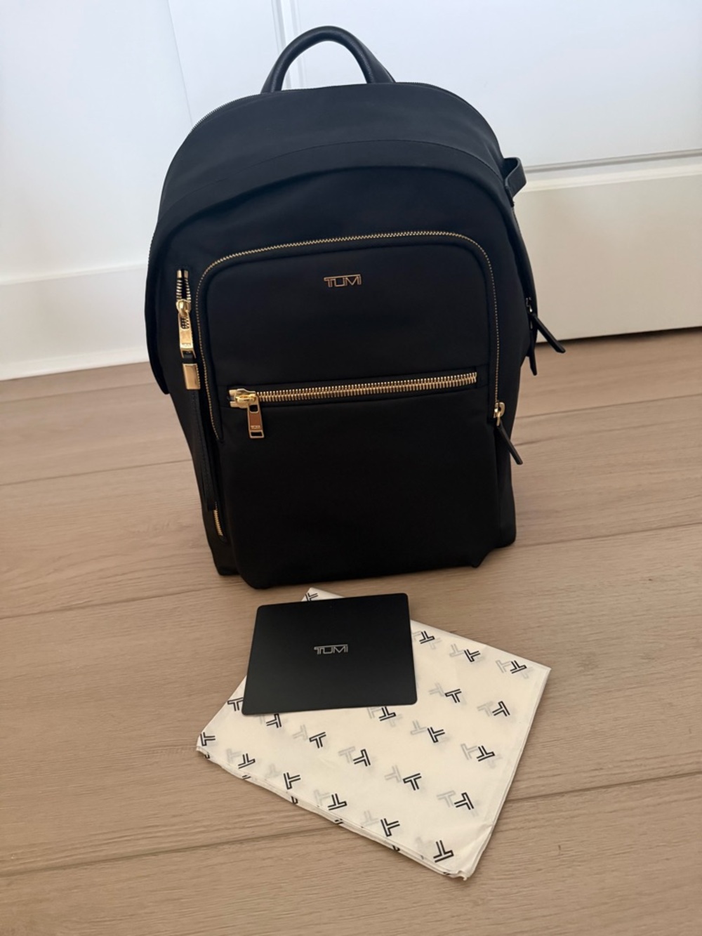 Tumi Black Backpack with Gold-Tone Hardware